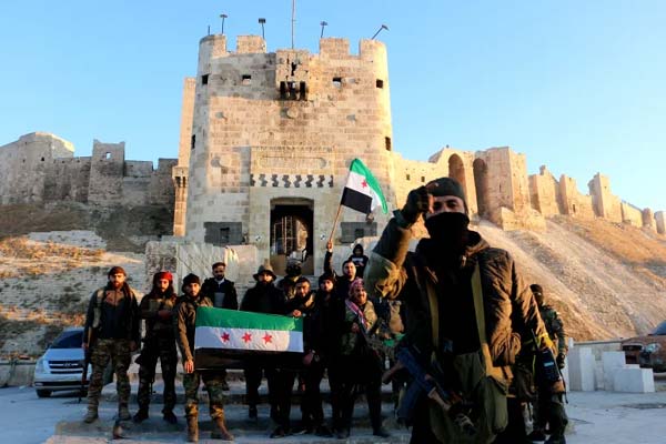 المعارضة السورية تسيطر على كامل إدلب ومطار حلب وتتوغل بحماة